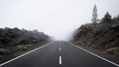 A road in foggy weather.
